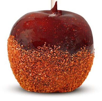 A red candy-coated apple dipped in powdered chili pepper.